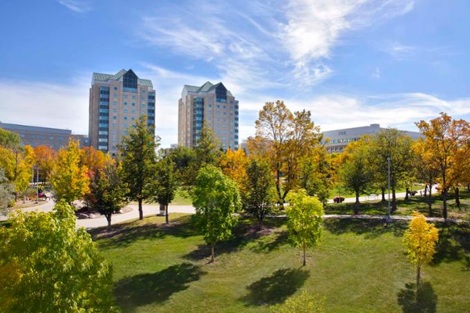 The residence towers at the University of Regina on a sunny day.