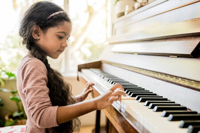 student playing piano