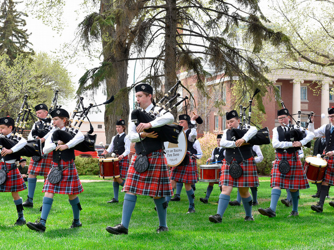 People playing the bagpipes.