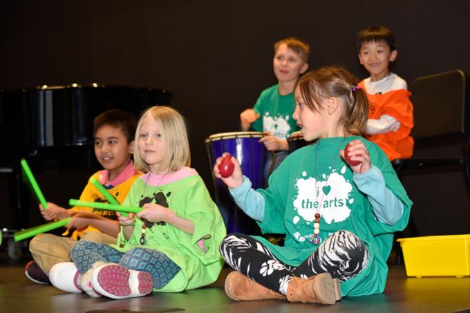 Students smiling enjoying summer camp. 