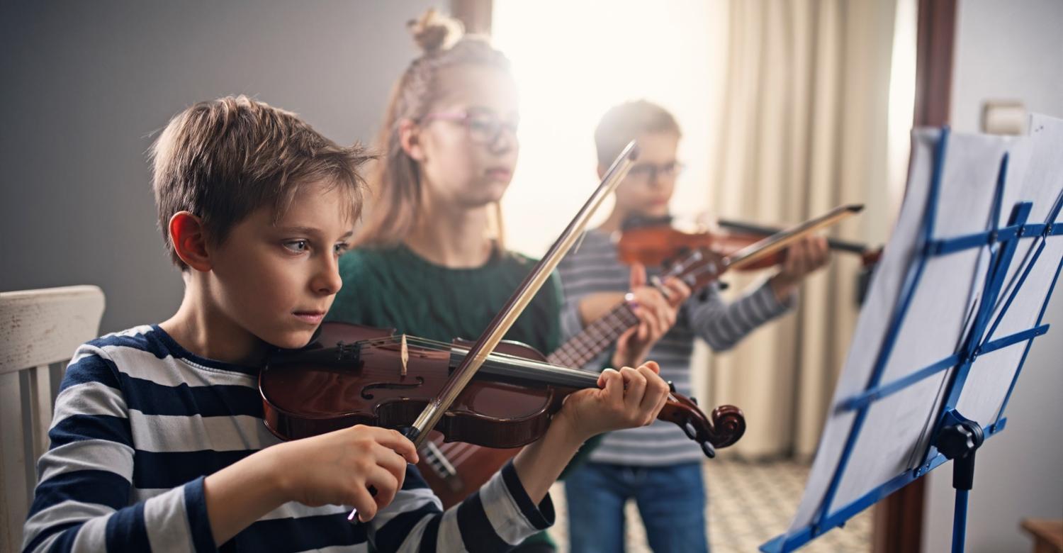Children playing violin