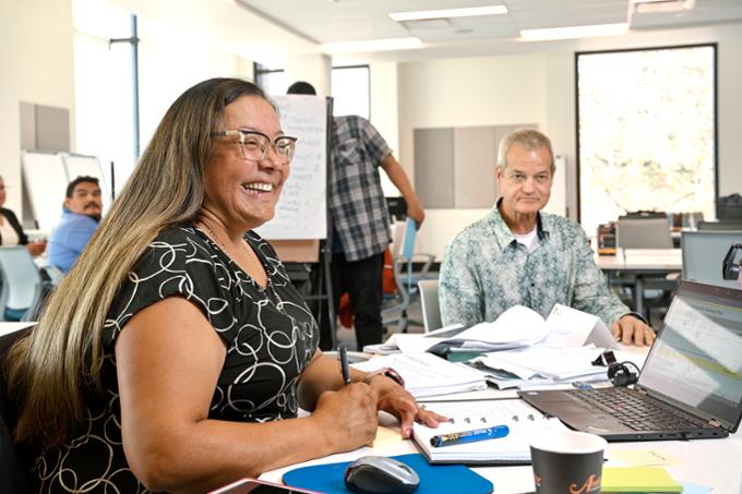 Arlene Pinay of Red Circle Planning Group enjoying Custom Training.