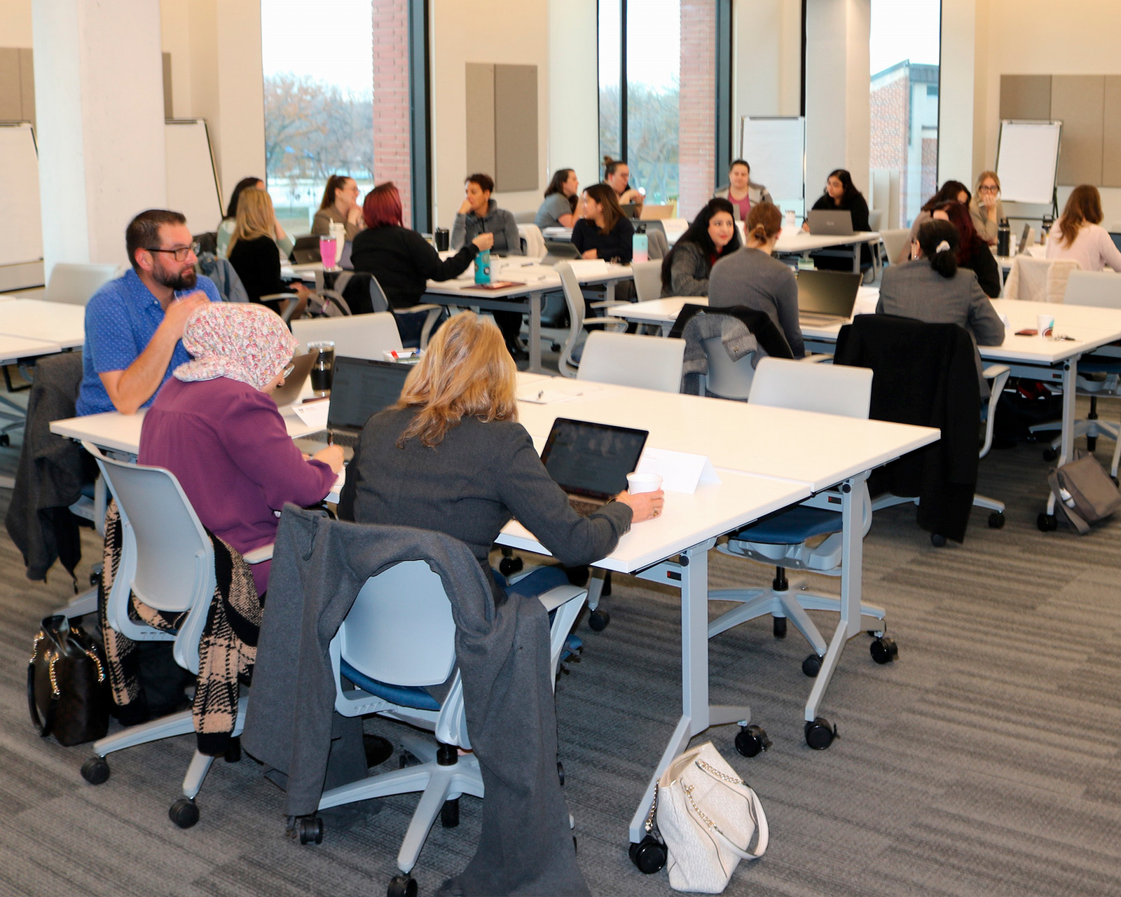 Adults in a class together as professional learners