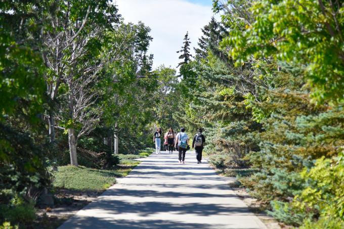 Students walking outdoors.