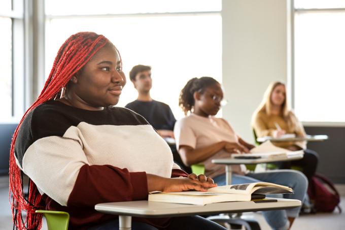 Students sit in a classroom