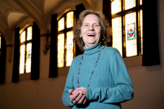 Woman laughing.