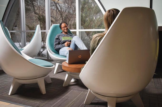 students sitting in chairs