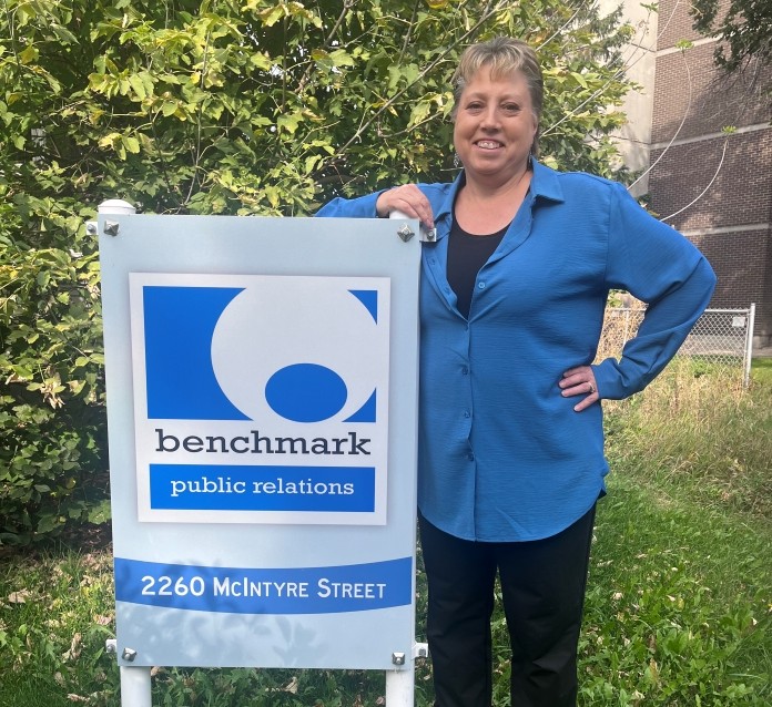 A picture of the Benchmark Public Relations sign at 2260 McIntyre Street.
