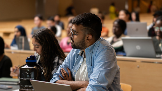 a female students sitting in a class