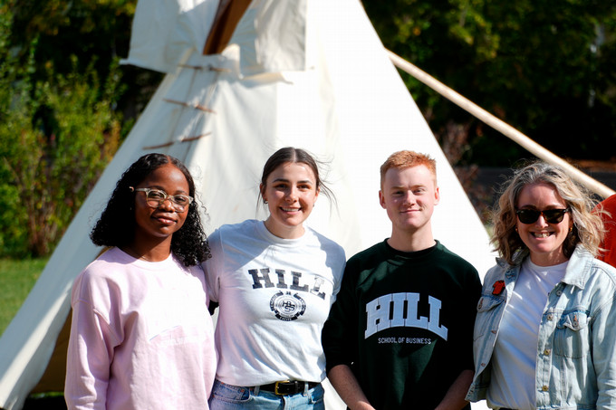 Dean Erin Oldford with Hill BSS students at tipi raising competition