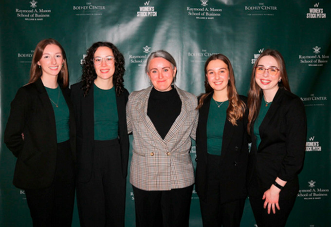 Dean Erin Oldford with UR Investing students