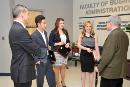 Paul Hill mingles with recipients of the Paul and Carol Hill Scholarship in Business Ethics on December 2