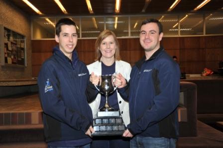  Faculty Advisor, Lisa Watson and co-captains Lyndon Kifferling and Mason Gardiner proudly showing off the JDC West “School of the Year” trophy.