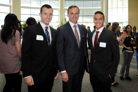 Dean Andrew Gaudes congratulates students at the Hill Legacy Ring Ceremony on September 19.