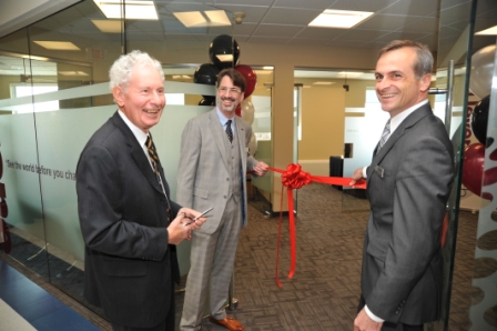 Naming gift donor, Kenneth Levene, cuts the ribbon with Ron Camp, Associate Dean Graduate and Andrew Gaudes, Dean to officially open the new Levene Space on the 6th floor of the Education Building on May 7