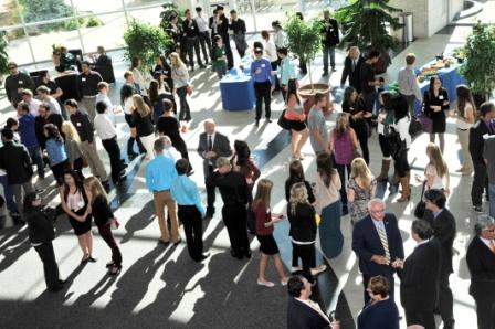 Students and members of the Faculty of Business Administration mingle at the inaugural Hill Legacy Pinning Ceremony on September 20.
