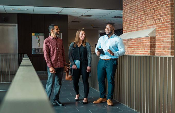 Three students walking together