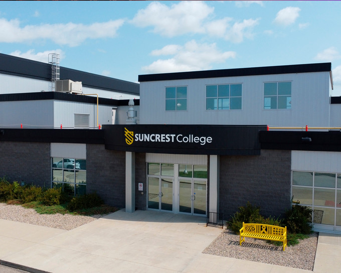 A wide shot of the front of a college building