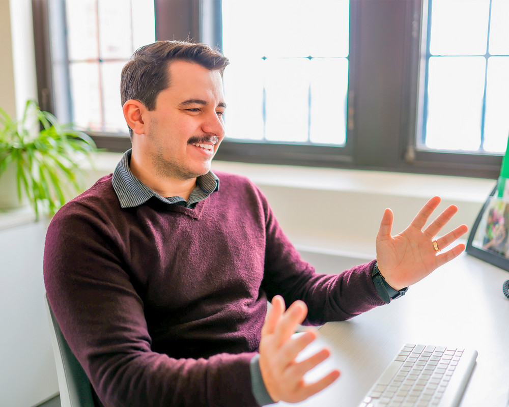 Man talking while in a chair