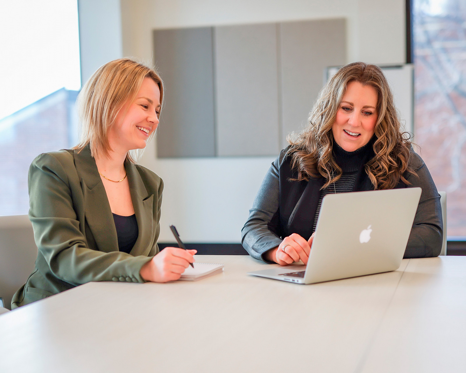 A U of R employee meets with a client