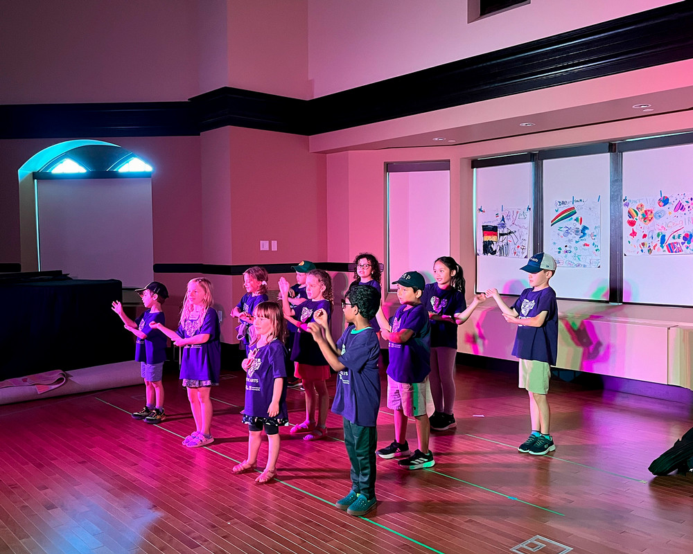 Children performing on stage