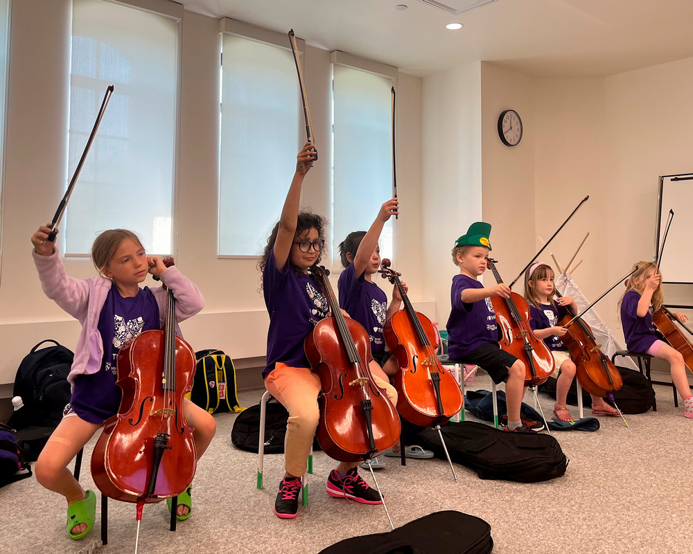 Kids playing cellos