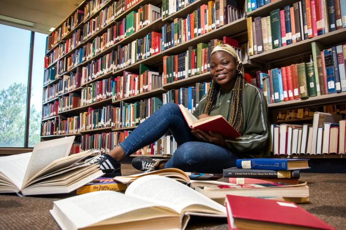 Student sitting in library