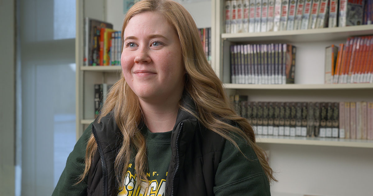 A woman pose for picture