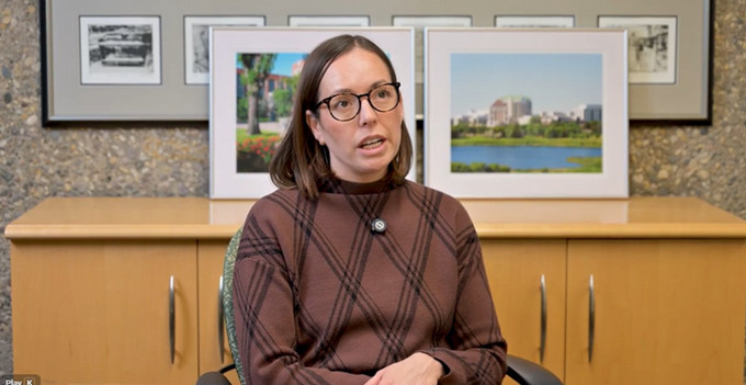 a person sitting at a desk.