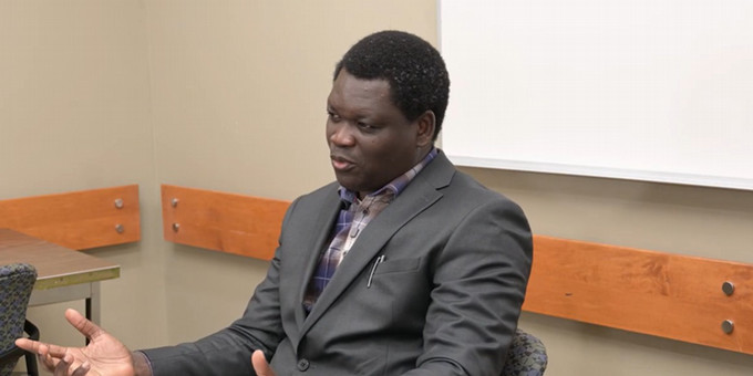 a person sitting at a desk.