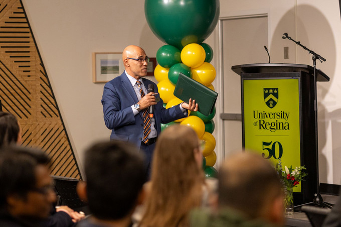 Aziz speaking