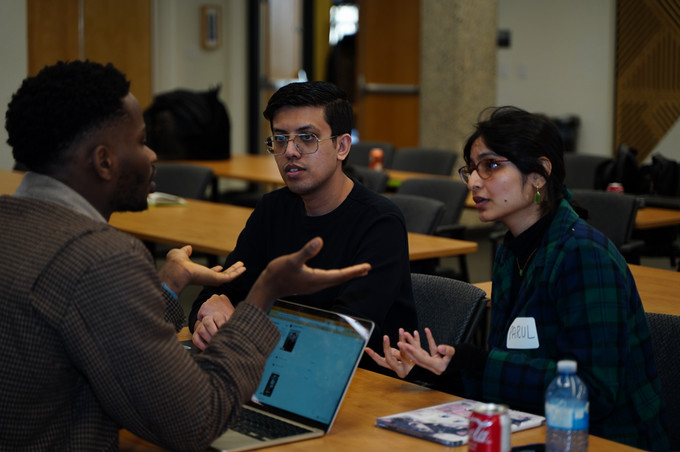 Students sitting at table