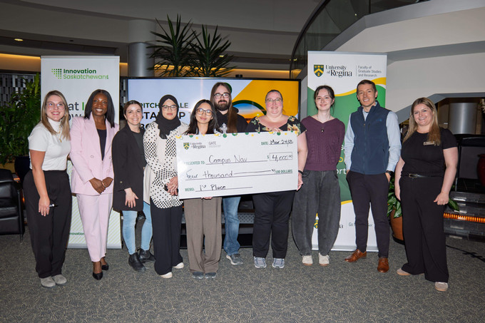 First place holding a cheque