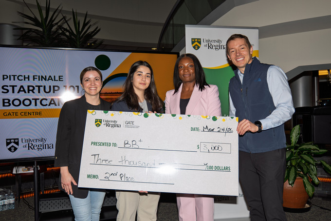 Second place holding cheque