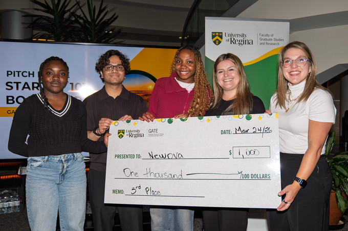 Third place holding cheque