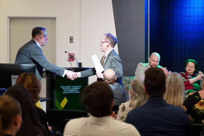Dr Keshen shaking hands