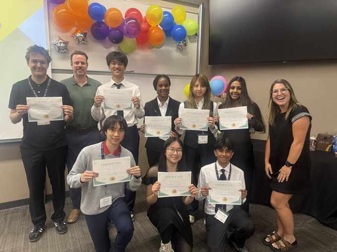 Students holding their winnings