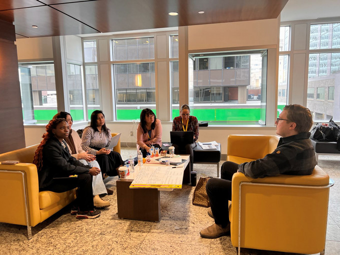 Students talking to mentor