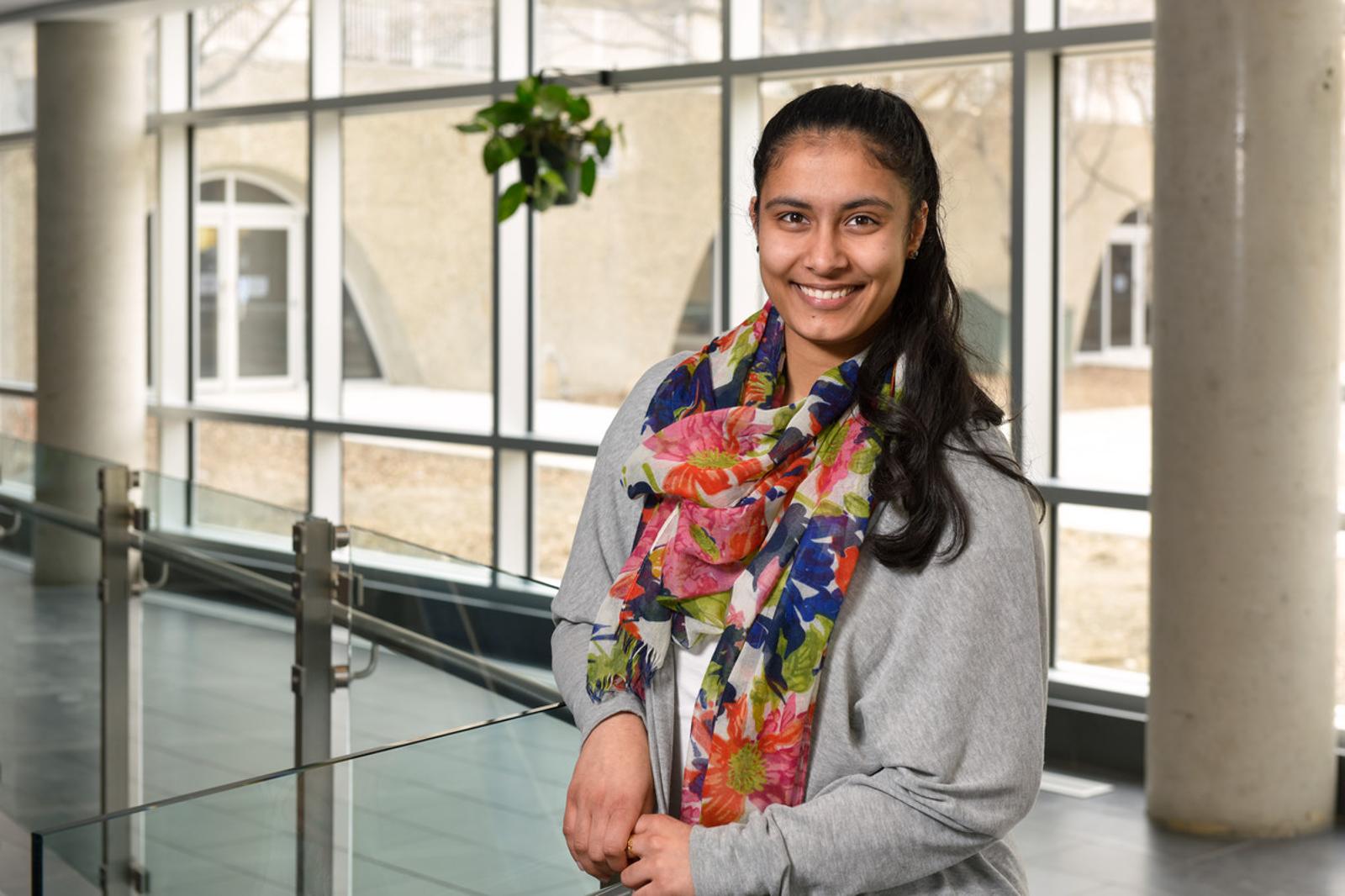 Graduate student in hallway