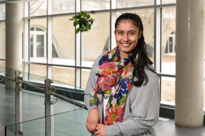 Graduate student in hallway