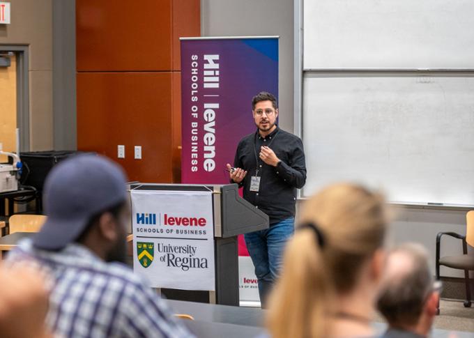 Victor Roman Morrow gives a presentation on the selected wicked problem.