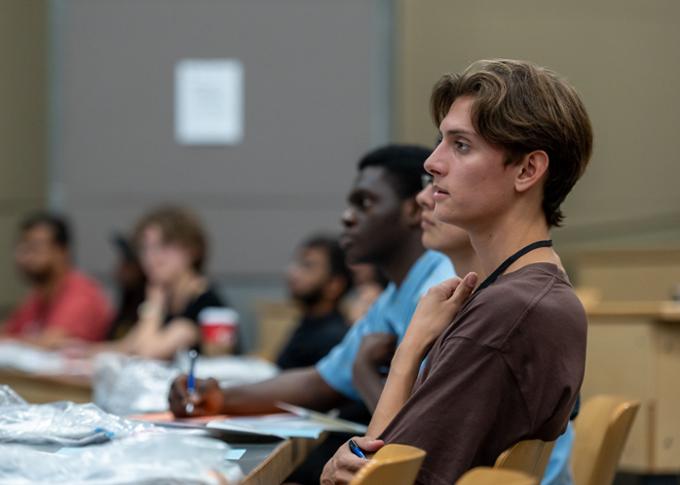 Participants listening to the presentation.