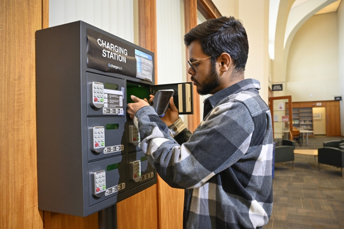 student charging cell at charge station