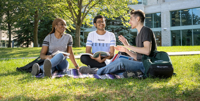 three people sitting 