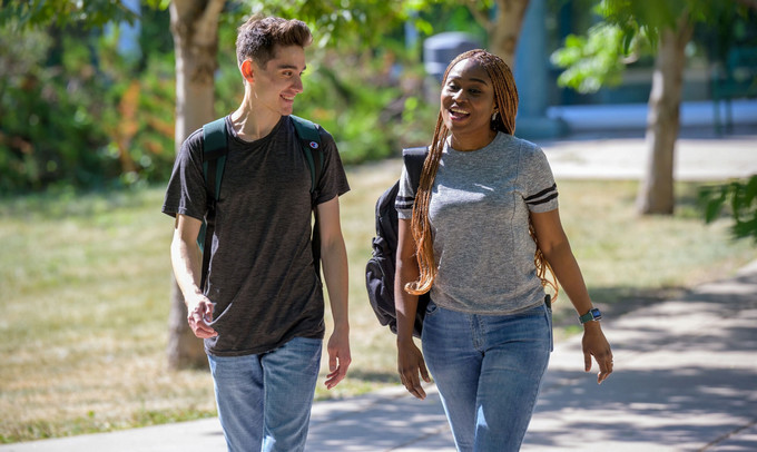 Two people walking 