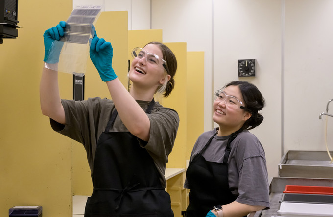 two people in a photo lab