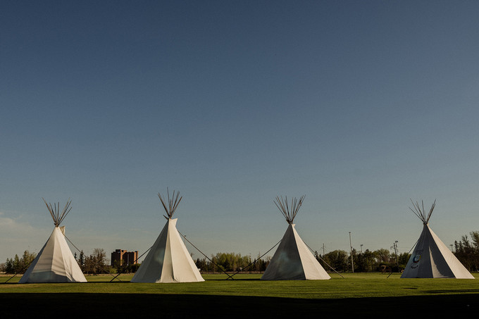 four tipis on campus
