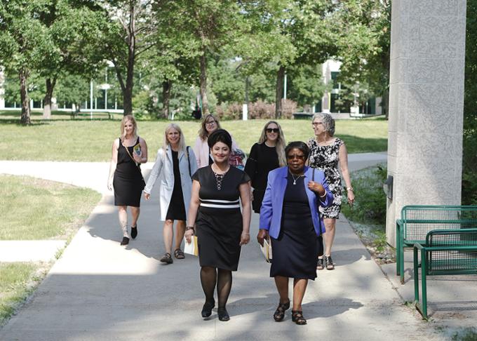 nursing faculty walking to convocation