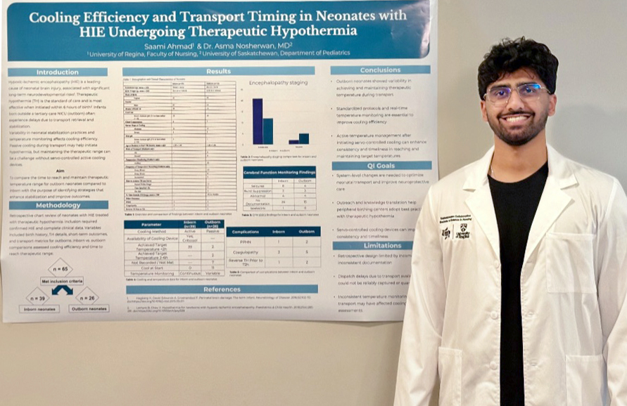 nursing student standing in front of conference poster