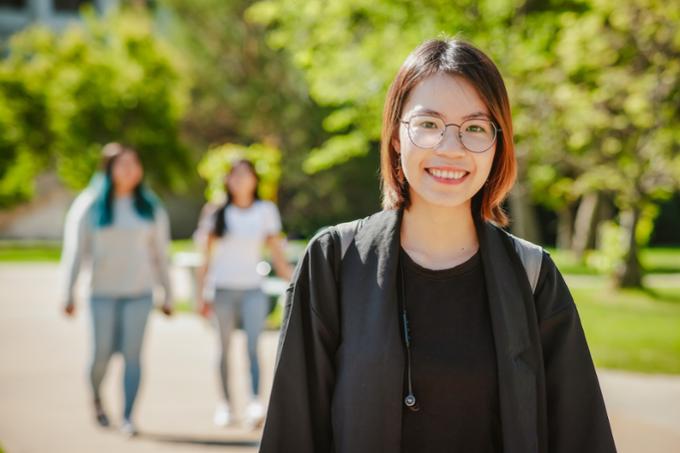 Student walking around campus.